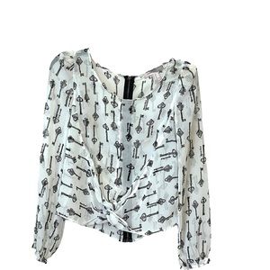 3 for $24 Sheer key print twist front blouse